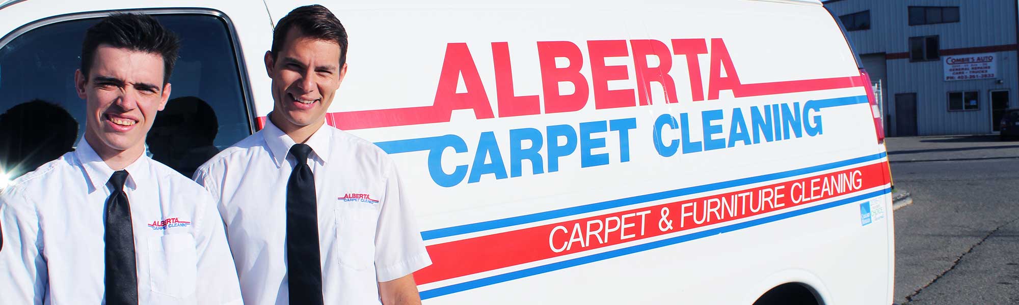 Two professionals standing before a Van featuring Calgary's Alberta Carpet Cleaning services.